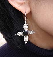 Pearl Cross Earrings - modelled