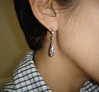 White Arabesque Earrings - Modeled