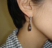 Black Arabesque Earrings - Modeled