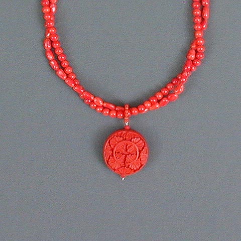 Coral & Wood Pendant - close-up